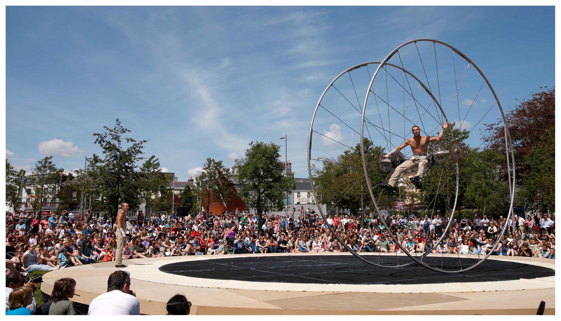 Galway Arts Festival Acrobat in a large Wheel